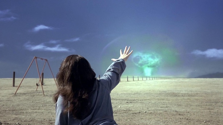 Ang Lee's Hulk Edith Banner reaching out with gamma explosion in background