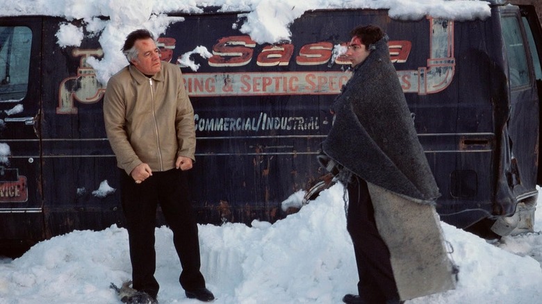 Paulie and Christopher standing in the snow with blood on their faces in The Sopranos