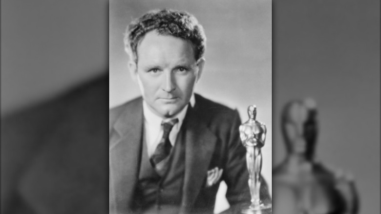 Frank Borzage with Oscar for "7th Heaven"