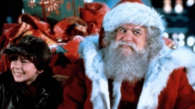 Santa Claus: The Movie boy and Santa in sled