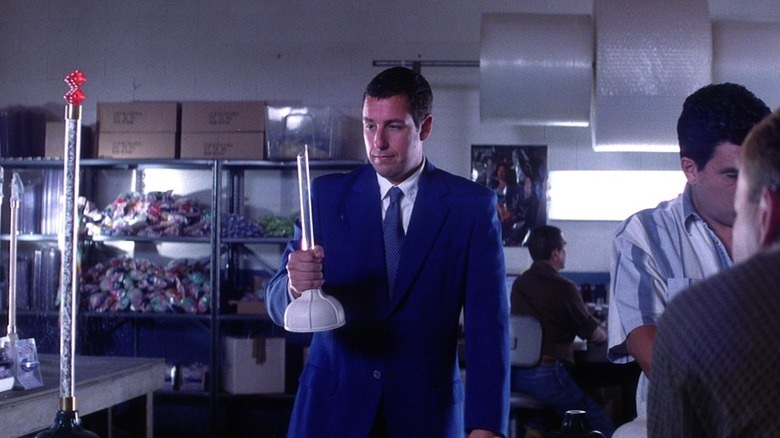 Punch Drunk Love Barry holding broken plunger