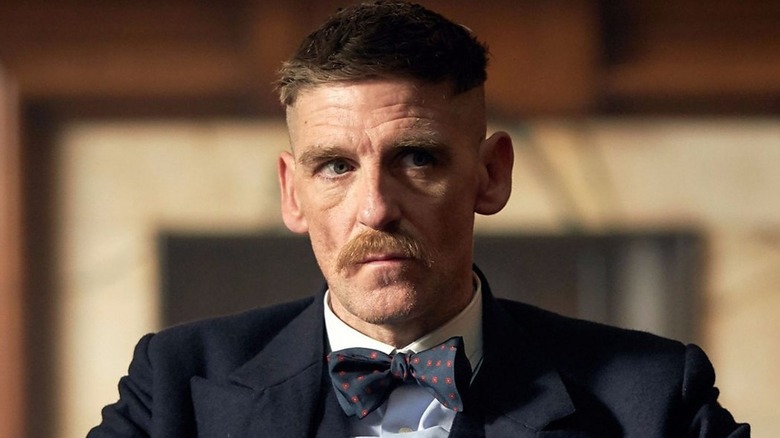 Paul Anderson as Arthur Shelby wearing a bow tie on Peaky Blinders