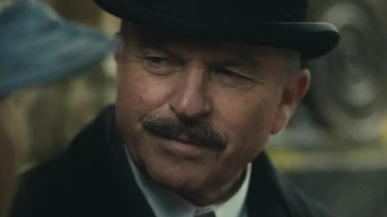 Sam Neill as Chester Campbell wearing a bowler hat on Peaky Blinders