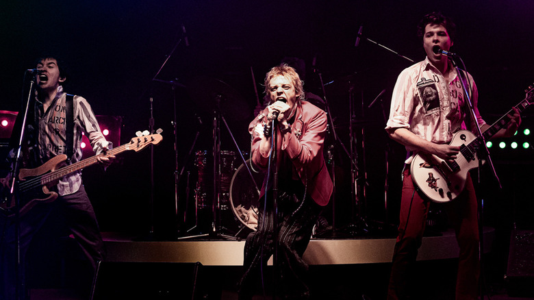 Toby Wallace as Steve Jones, Anson Boon as Johnny Rotten, and Louis Partridge as Sid Vicious in "Pistol" 