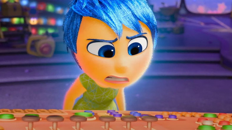 Joy confused by the orange console in Inside Out 2