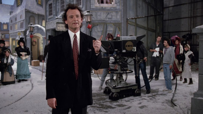 Bill Murray as Frank Cross on set in Scrooged