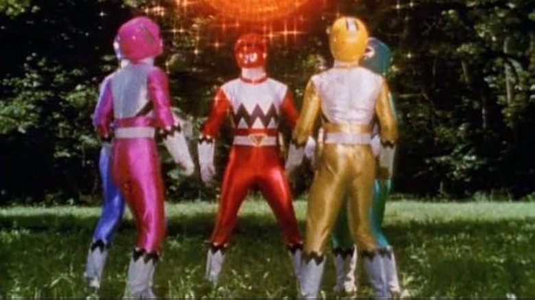 The Rangers standing in a circle in Power Rangers Lost Galaxy