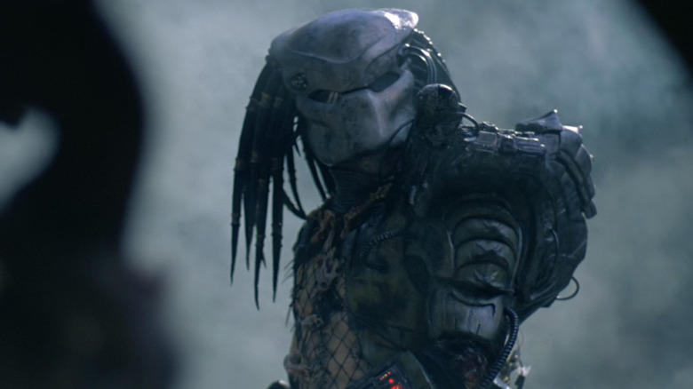 The alien hunter, mask on, in the movie Predator