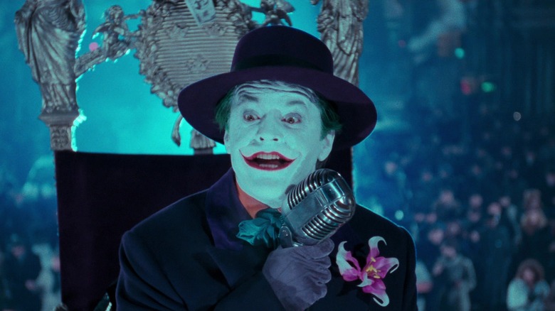 The Joker on a float, speaking into a microphone, as seen in the 1989 version of Batman.