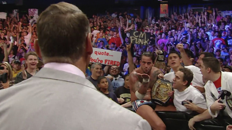 CM Punk kisses Vince McMahon and the WWE goodbye after winning the WWE Championship