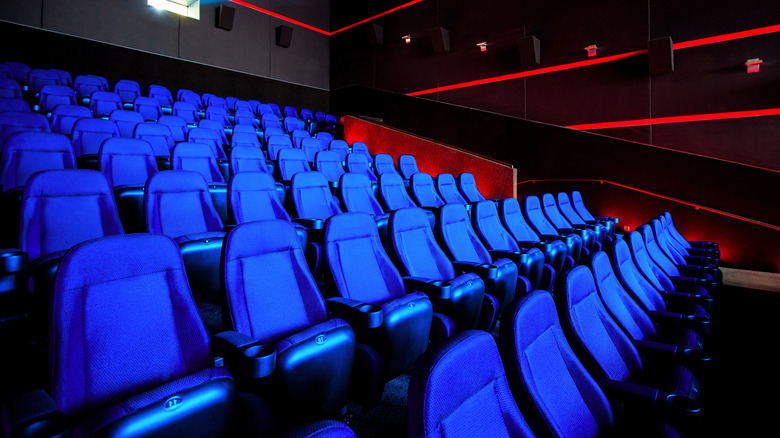 rows of blue movie theater seats