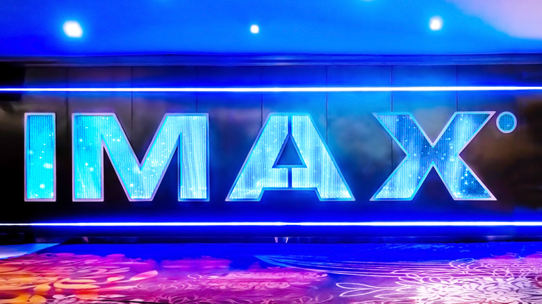 blue IMAX sign in a theater