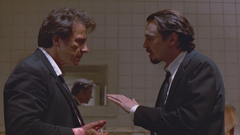 Reservoir Dogs white and pink talking in bathroom