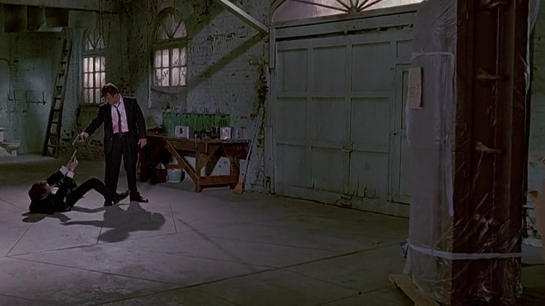 Reservoir Dogs pink and white pointing guns in room