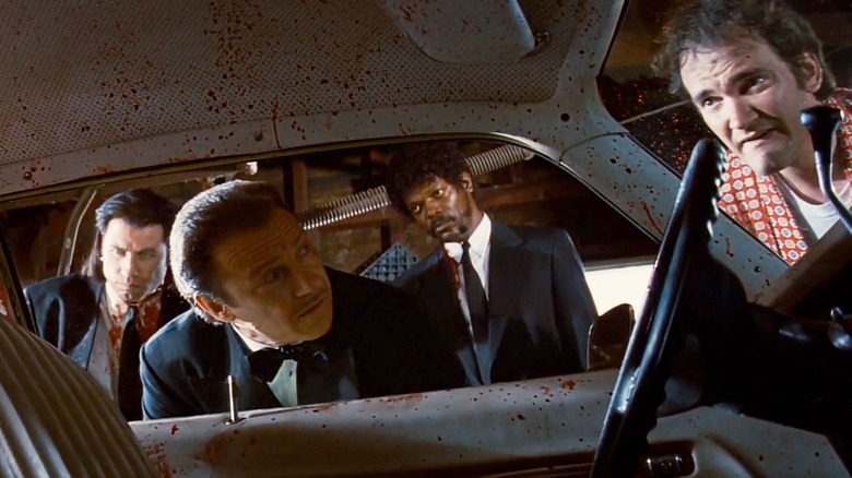 John Travolta, Harvey Keitel, Samuel L. Jackson and Quentin Tarantino in Pulp Fiction