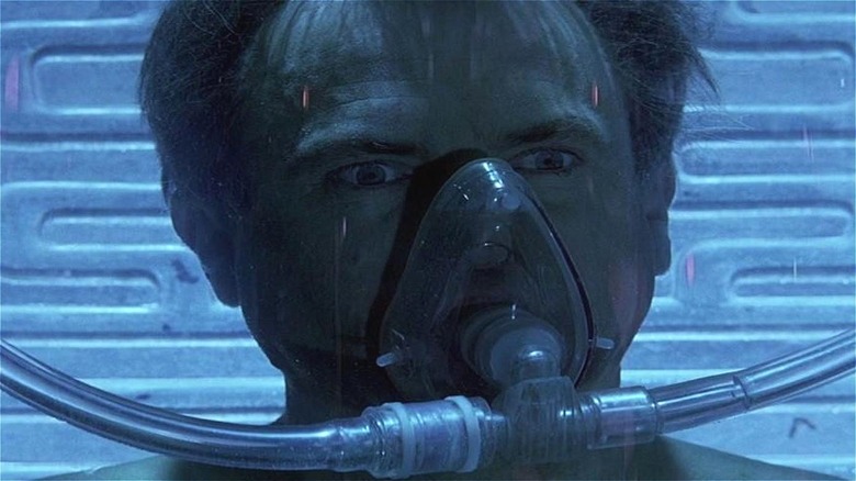 Billy wakes in a cryochamber