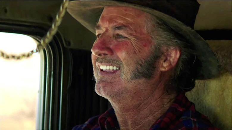 Mick Taylor driving his truck