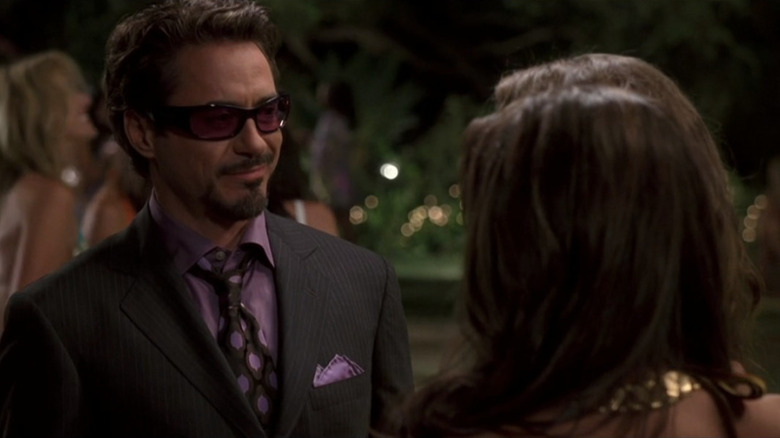 Tony Stark wearing sunglasses looking smug