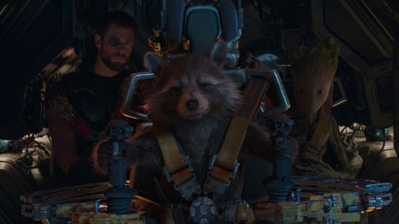 Rocket flying spaceship with Thor and Groot