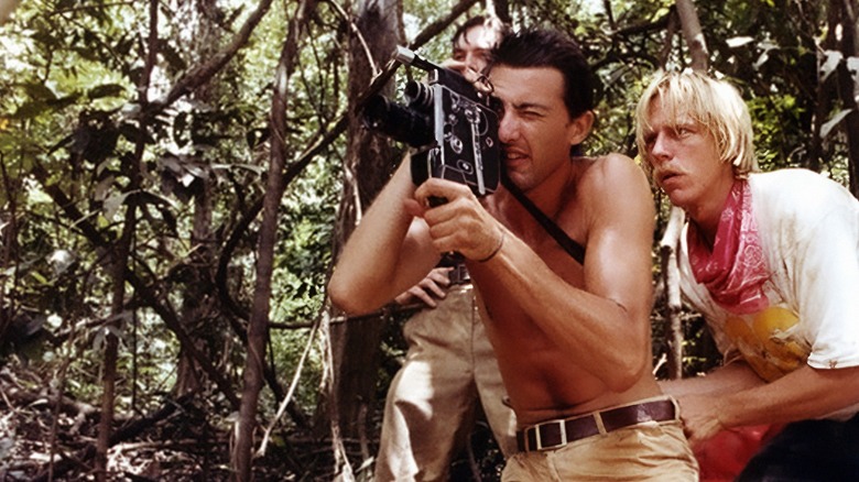 Documentarians filming in jungle