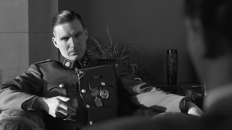 Ralph Fiennes holding drink Schindler's List