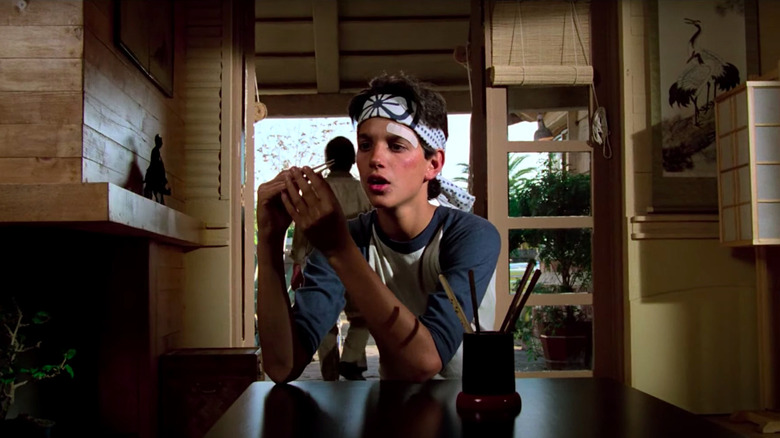 Ralph Macchio succeeds in catching a fly with chopsticks in The Karate Kid