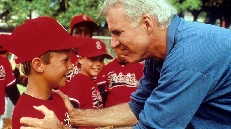 Steve Martin hugs little leaguer