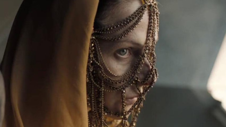 Lady Jessica in a beaded veil, close-up