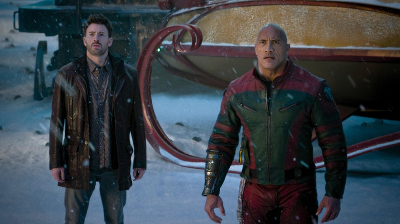 Chris Evans as Jack O'Malley and Dwayne Johnson as Callum Drift staring in shock in Red One