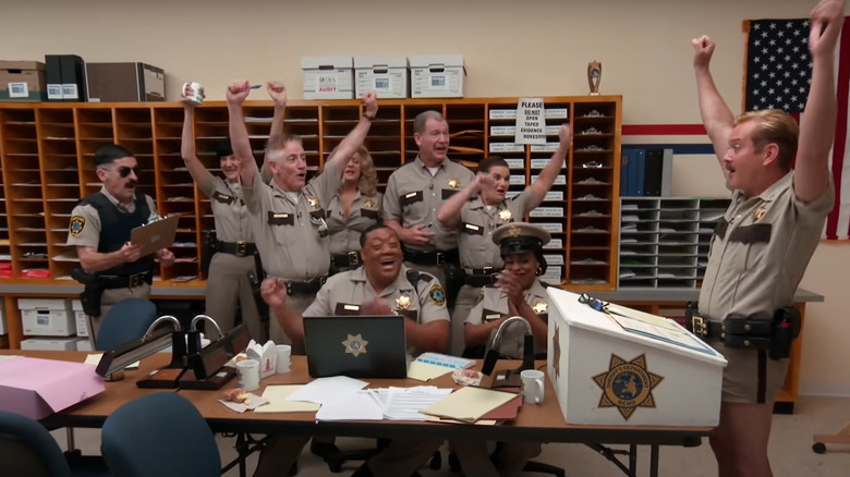 Still from Reno 911! The Hunt for QAnon