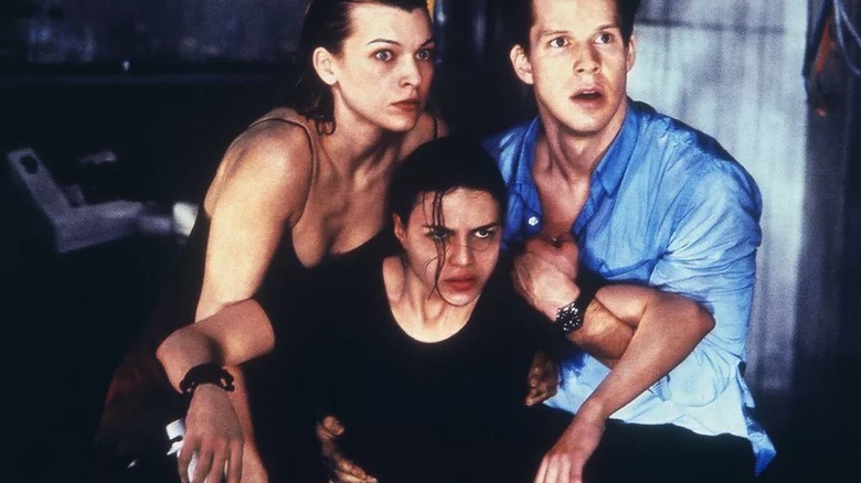 Milla Jovovich, Michelle Rodriguez, and Eric Mabius in Resident Evil
