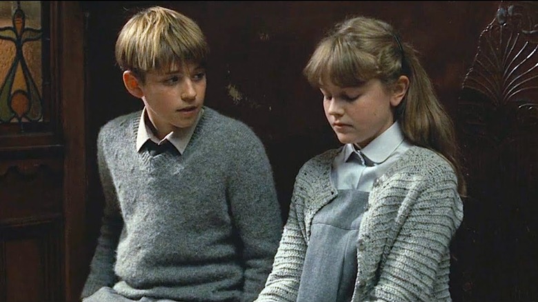 Never Let Me Go, Charlie Rowe and Isobel Meikle-Small 