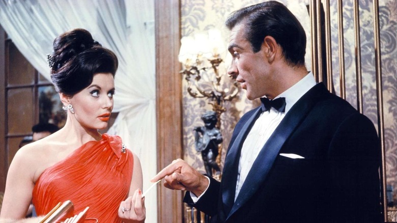 Sean Connery as James Bond meets with Eunice Gayson as Sylvia Trench at the casino in Dr. No