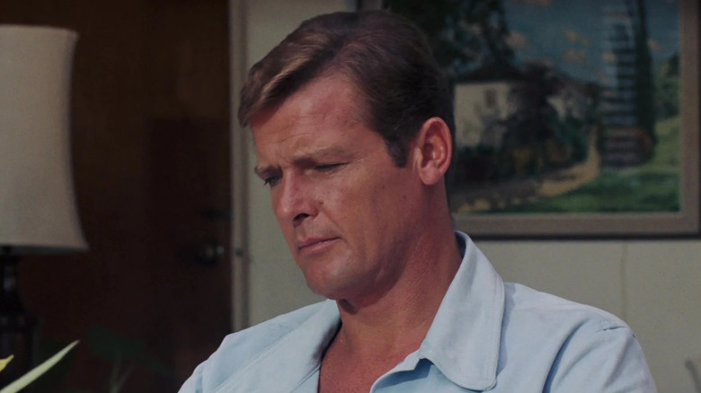 James Bond of Roger Moore looks confused in Live and Let Die