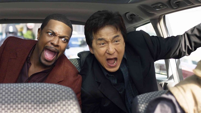 Detective Carter and Chief Inspector Lee screaming in a car