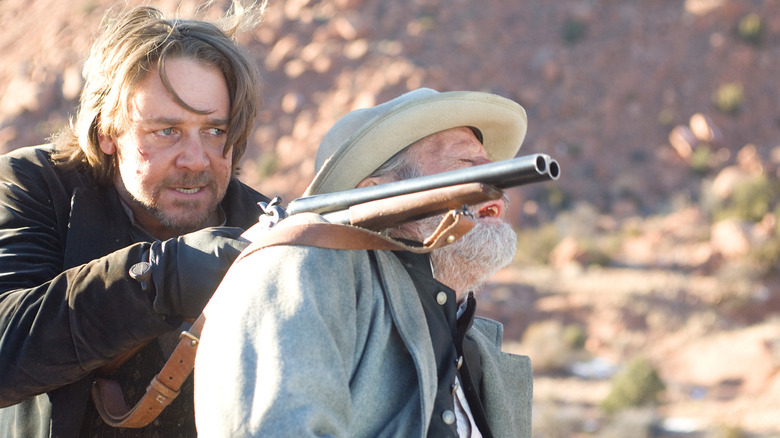 Ben Wade holding man hostage gun 3:10 to Yuma