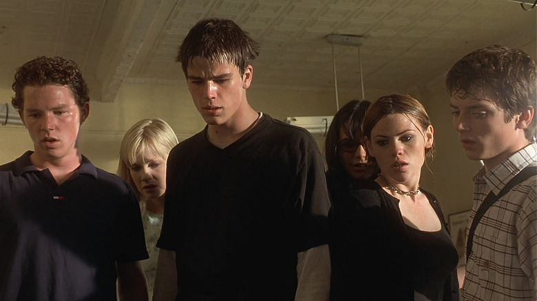 Stan, Marybeth, Zeke, Delilah, Stokes, and Casey look down in horror in The Faculty