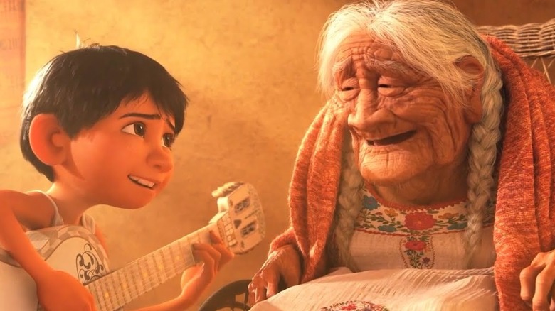 Miguel playing guitar for Mama Coco in Coco 