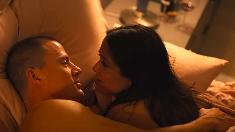 Channing Tatum and Salma Hayek Pinault cuddle in bed in Magic Mike's Last Dance