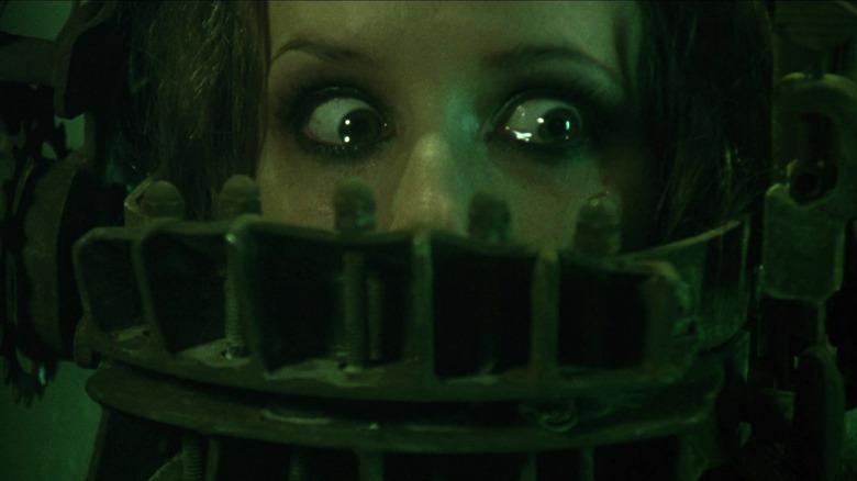 Amanda in the reverse bear trap in Saw