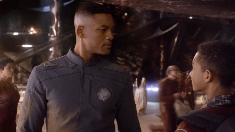 Cypher Raige (Will Smith) looking at his son Kitai (Jaden Smith) in After Earth