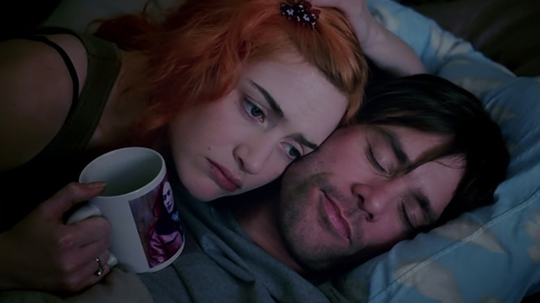 Clementine (Kate Winslet) laying on Joel (Jim Carrey) in Eternal Sunshine of the Spotless Mind