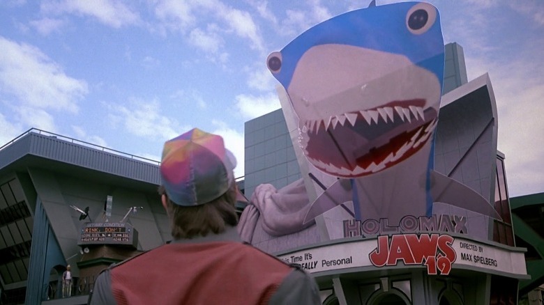 Marty McFly looking at Jaws 19 hologram