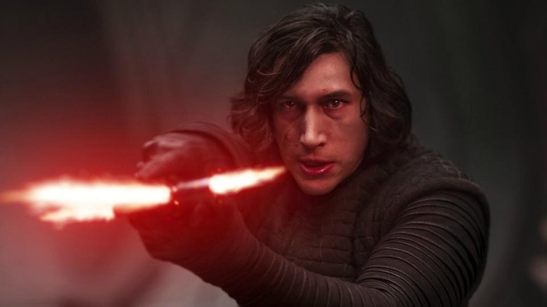 Kylo Ren pointing lightsaber