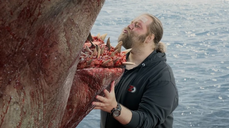 Ólafur Darri Ólafsson blows a dead shark a kiss