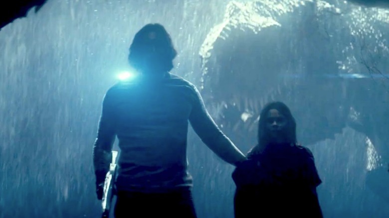 Adam Driver in rain t-rex behind 65