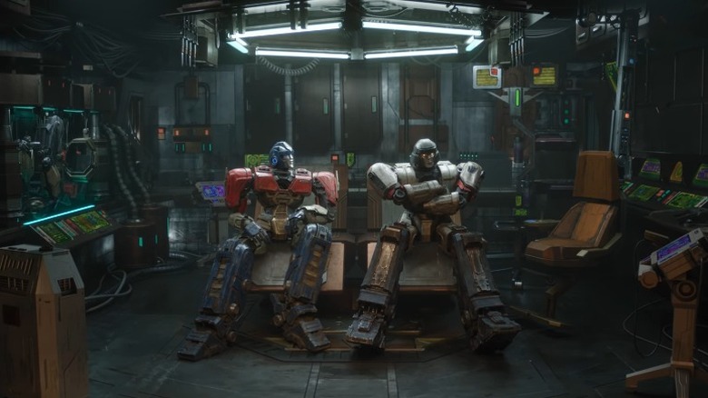 Orion Pax sitting next to D-16 in Transformers One