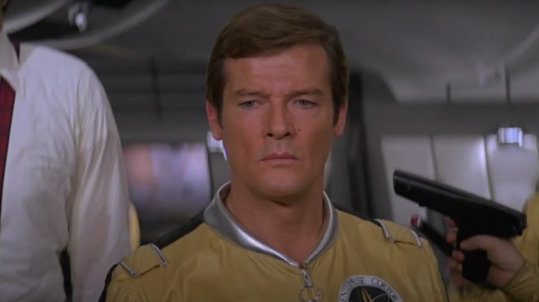 Roger Moore's James Bond is held at gunpoint in Moonraker