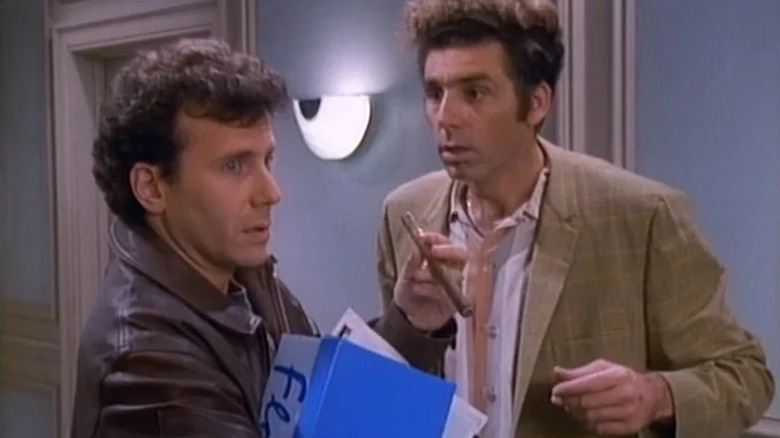 Paul Reiser as Paul and Michael Richardson as Cosmo Kramer on Mad About You