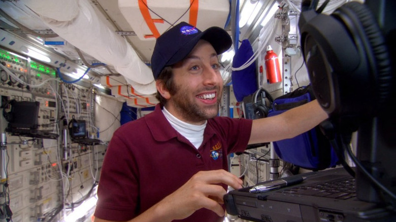 Howard video chatting and smiling in the International Space Station on The Big Bang Theory